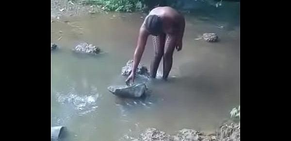  hot african woman taking bath